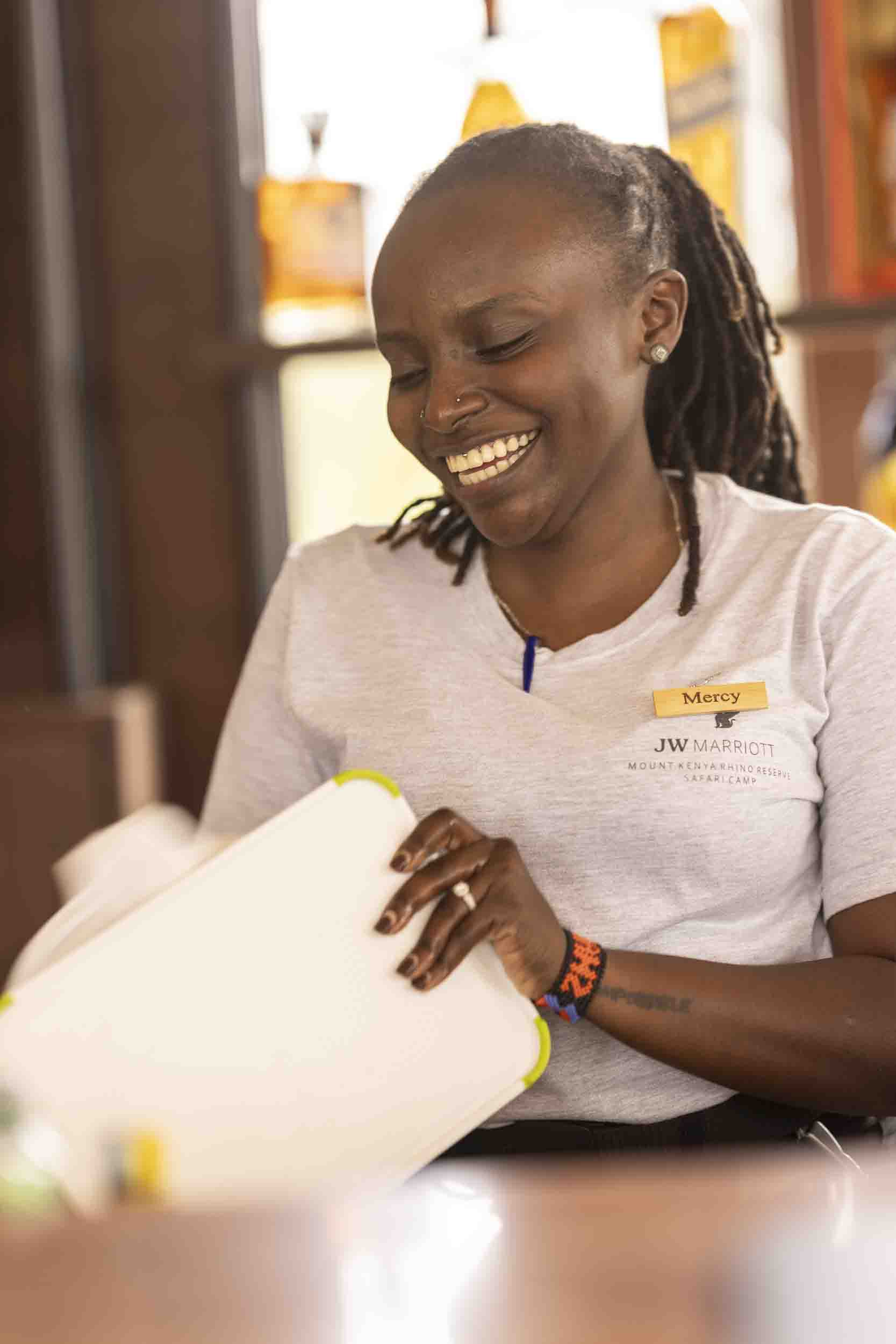A mixologist at the bar, JW Marriott Mount Kenya Rhino Reserve Safari Camp
