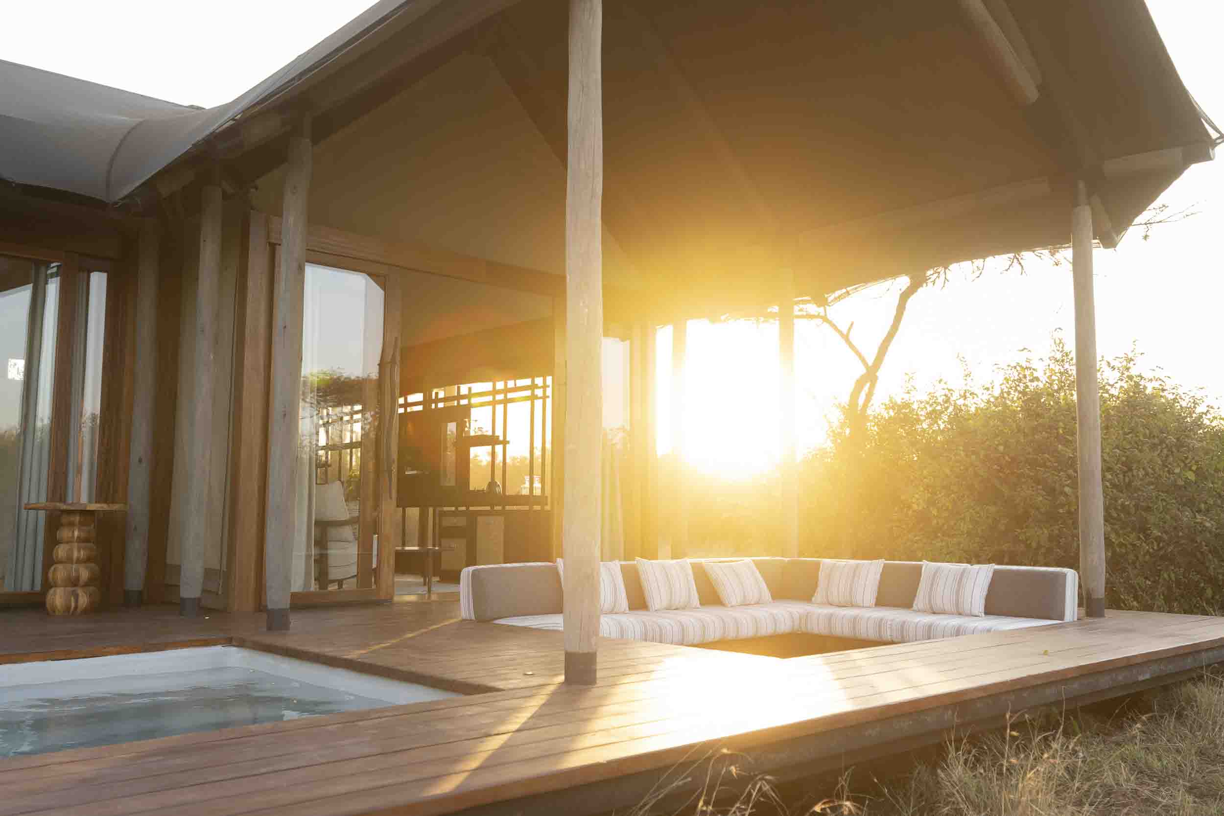 A room and pool at sunset, JW Marriott Mount Kenya Rhino Reserve Safari Camp, Solio Game Reserve